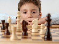 Boy playing the chess